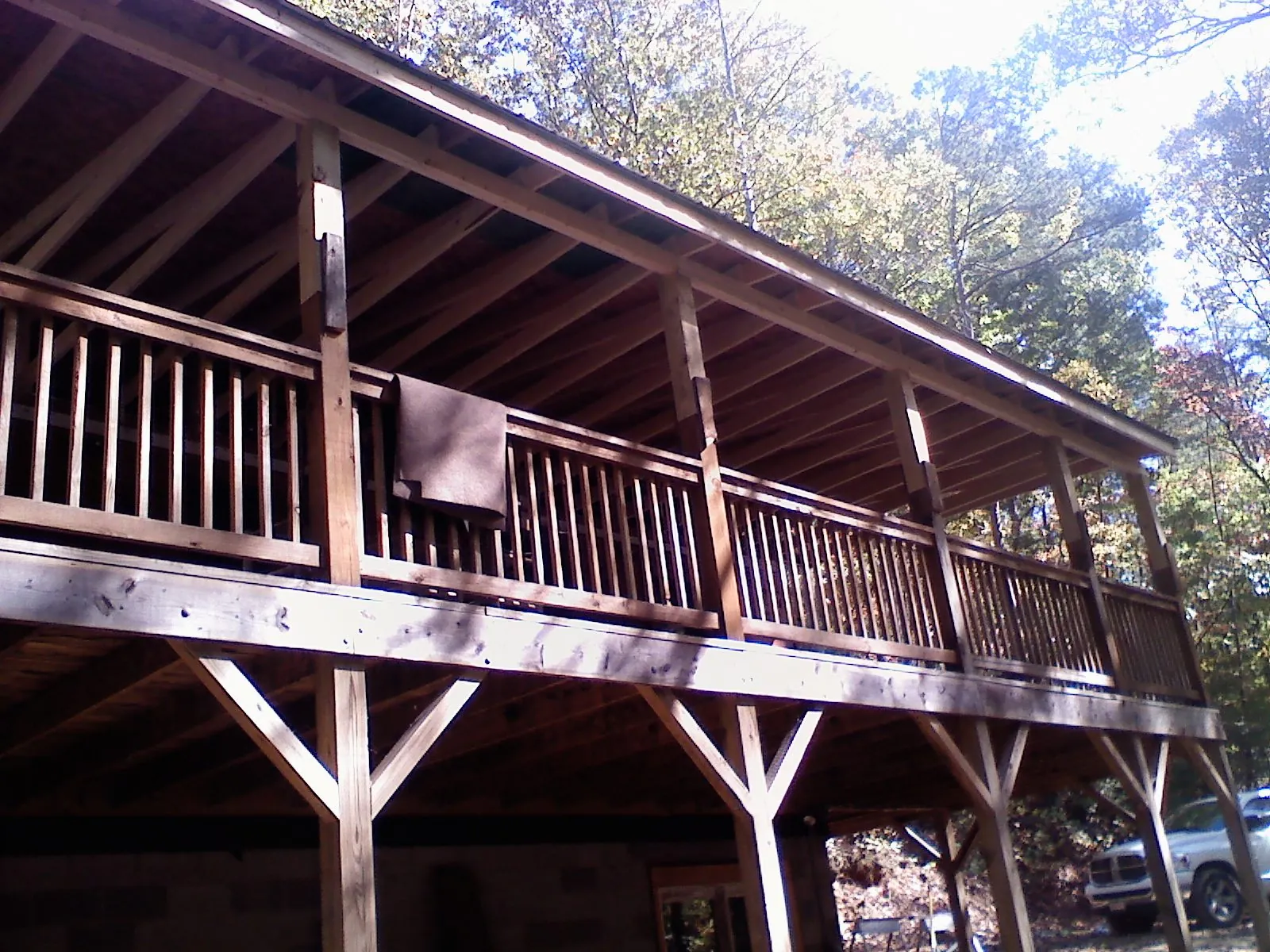 Timber framing under a new elevated porch and deck — Roof Leak Repair in Goldsmith by Roofing Brothers